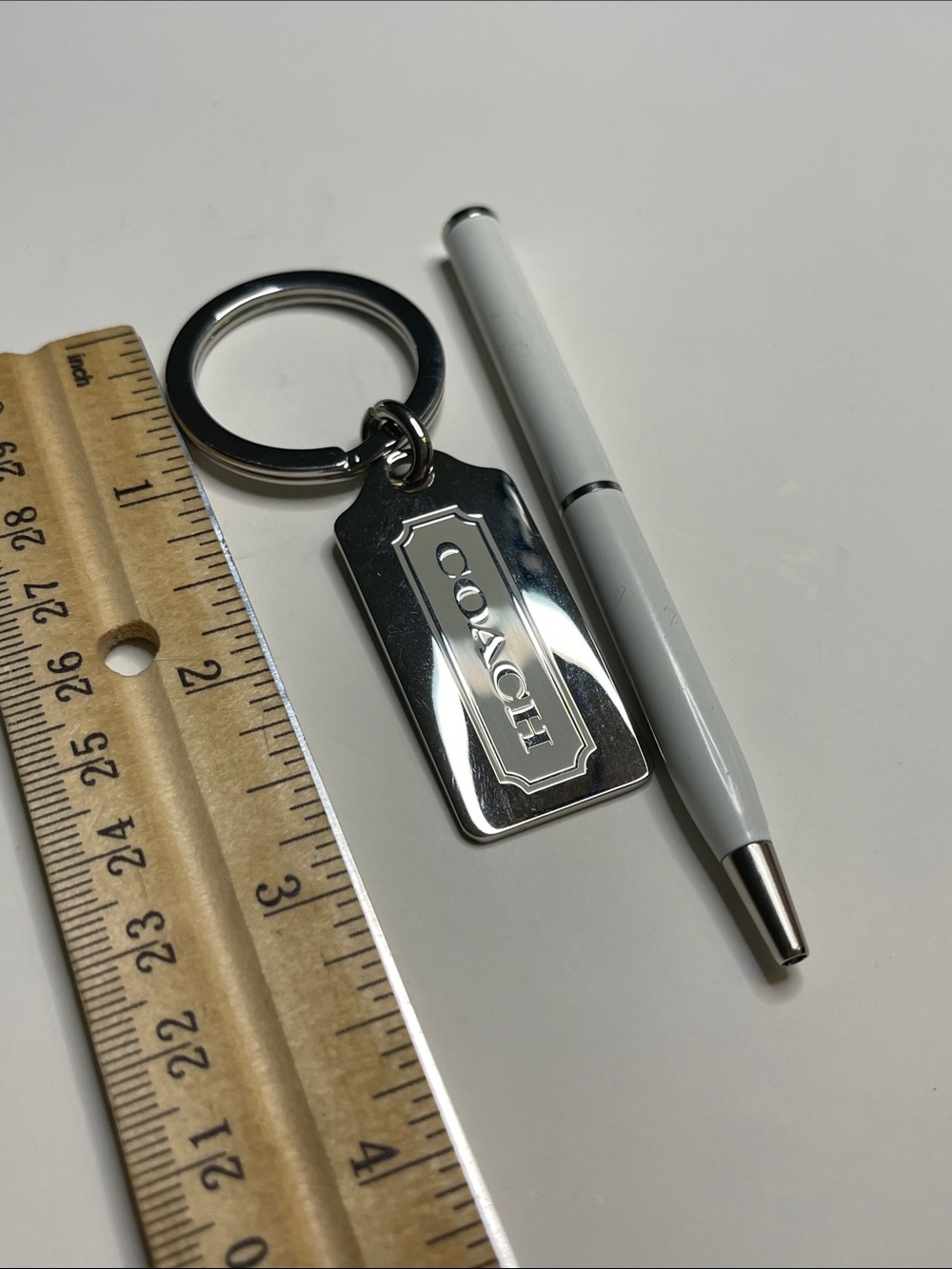 Coach Silver Rectangular Logo Tag Keychain and Coach Pen - Picture 3 of 6